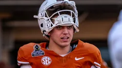 Arch Manning 16 of the Texas Longhorns during warmups before the game vs the Clemson Tigers in the first round of the playoffs at DKR-Memorial Stadium.