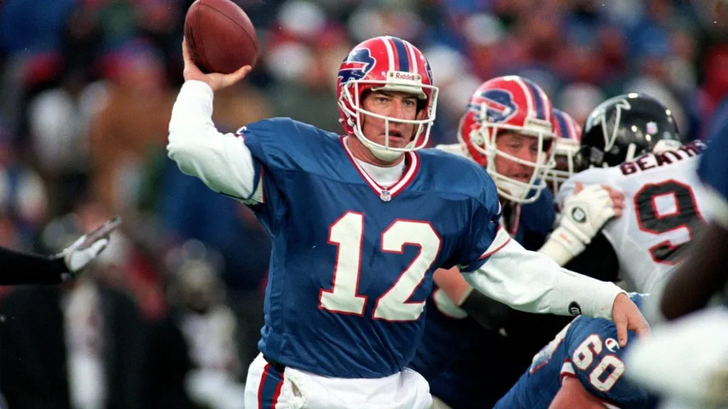 Jim Kelly #12 of the Buffalo Bills gets ready to pass the ball during the game against the Atlanta Falcons on November 12, 1995. (Source: Getty Images)