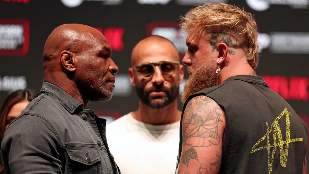 (L-R) Mike Tyson, Nakisa Bidarian, and Jake Paul attend the press conference for LIVE on Netflix: Jake Paul vs. Mike Tyson at the Toyota Music Factory on November 13, 2024 in Dallas, Texas. (Photo by Brett Carlsen/Getty Images for Netflix © 2024)