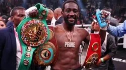 Terence Crawford celebrates with the championship belt after defeating Errol Spence Jr. in the World Welterweight Championship bout at T-Mobile Arena on July 29, 2023 in Las Vegas, Nevada.