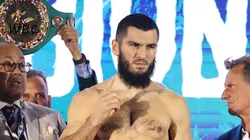 Artur Beterbiev reacts as he poses for a photo ahead of the IBF, IBO, WBC and WBO World Light Heavyweight titles' fight between Artur Beterbiev and Dmitrii Bivol during the weigh-in as part of the Riyadh Season - IV Crown Showdown at The Venue on October 11, 2024 in Riyadh, Saudi Arabia.
