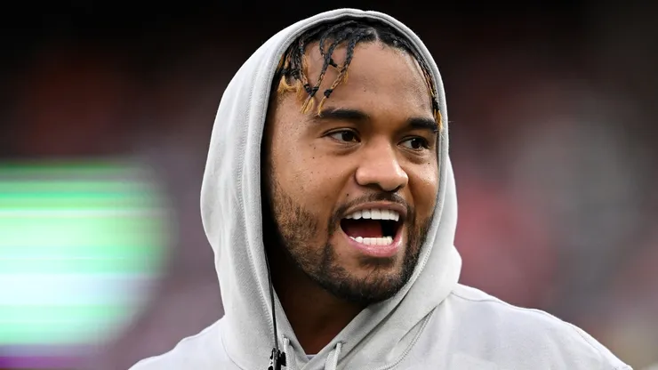 Tua Tagovailoa #1 of the Miami Dolphins reacts in the first quarter against the Cleveland Browns at Huntington Bank Field on December 29, 2024 in Cleveland, Ohio.