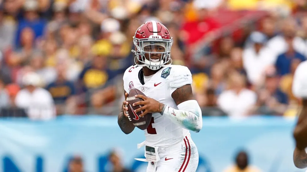 Jalen Milroe #4 of the Alabama Crimson Tide looks to pass against the Michigan Wolverines during the first quarter in the 2024 ReliaQuest Bowl at Raymond James Stadium on December 31, 2024 in Tampa, Florida.