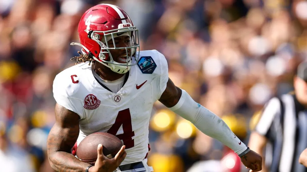 Jalen Milroe #4 of the Alabama Crimson Tide runs with the ball against the Michigan Wolverines during the second quarter in the 2024 ReliaQuest Bowl at Raymond James Stadium on December 31, 2024 in Tampa, Florida.