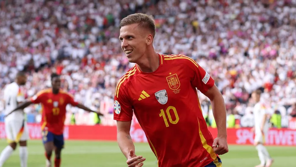 Dani Olmo of Spain celebrates after scoring