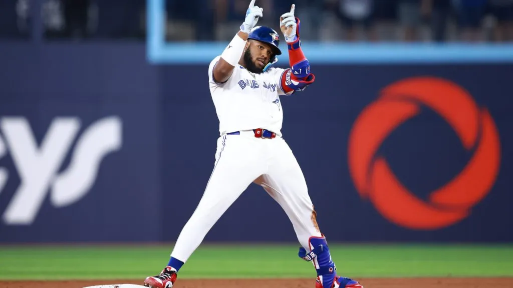Vladimir Guerrero Jr. #27 of the Toronto Blue Jays celebrates after hitting an RBI double in the eighth inning during a game against the New York Yankees at Rogers Centre on June 29, 2024 in Toronto, Ontario, Canada. (Photo by Vaughn Ridley/Getty Images)