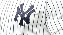 A jersey close-up of Aaron Judge #99 of the New York Yankees reacting after striking out swinging in the fifth inning against the Washington Nationals at Yankee Stadium on August 22, 2023, in the Bronx borough of New York City.