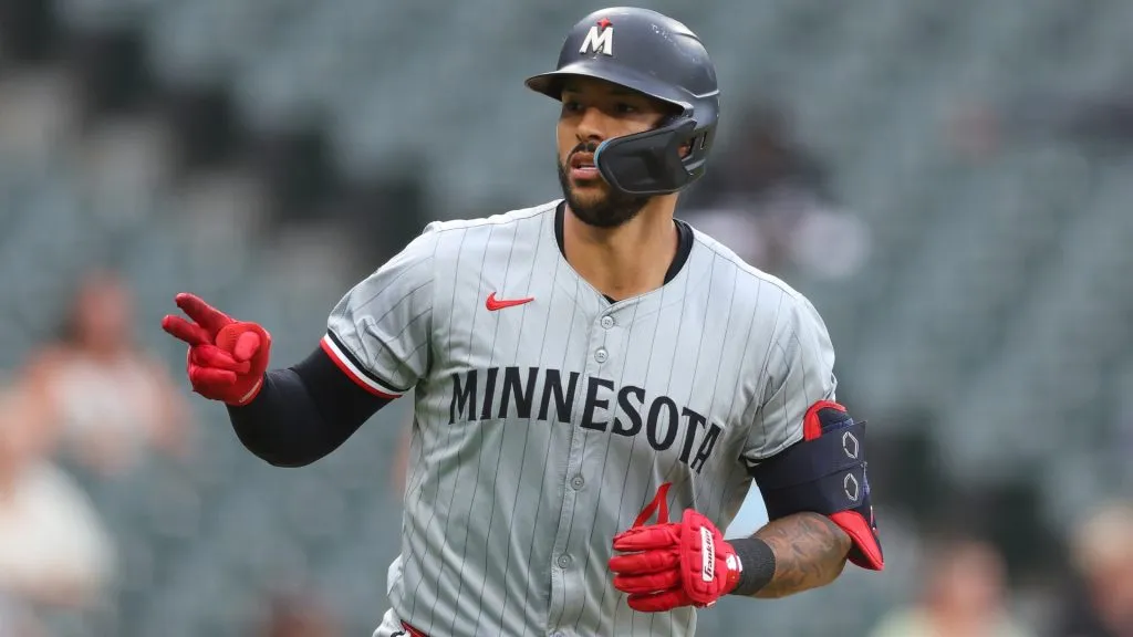 : Carlos Correa #4 of the Minnesota Twins reacts after hitting a solo home run off Drew Thorpe #33 of the Chicago White Sox (not pictured) during the sixth inning at Guaranteed Rate Field on July 10, 2024 in Chicago, Illinois. (Photo by Michael Reaves/Getty Images)