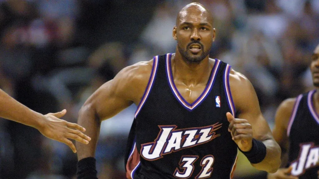 Karl Malone #32 of the Utah Jazz runs upcourt in game four of round one in the NBA playoffs against the Dallas Mavericks in 2001. (Source: Ronald Martinez/Allsport)