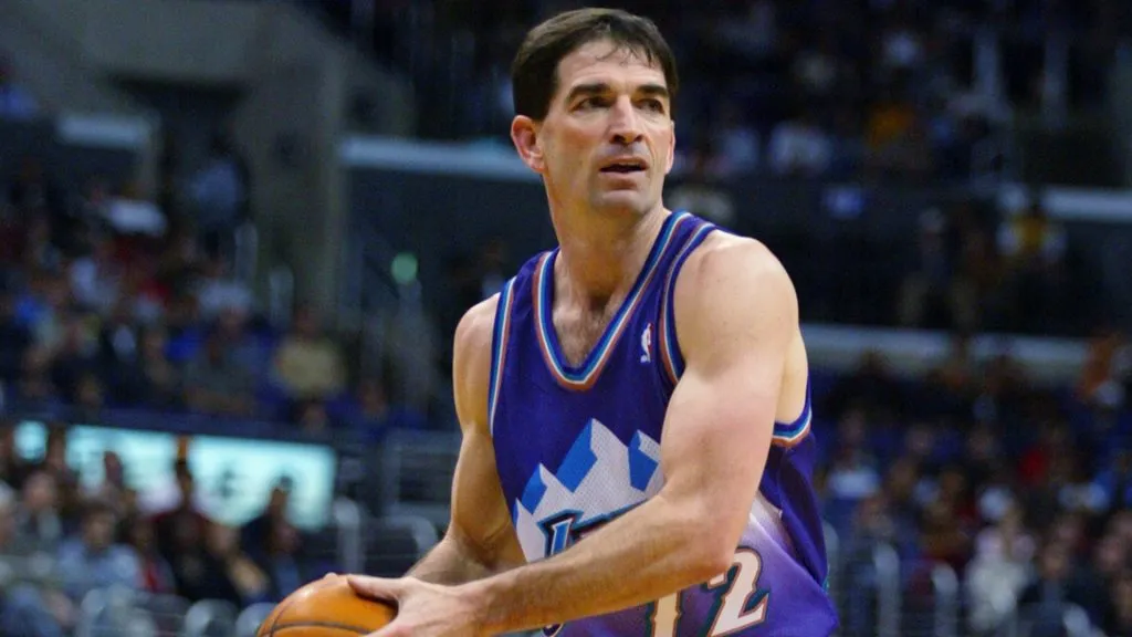 John Stockton #12 of the Utah Jazz looks to pass during the game against the Los Angeles Clippers at Staples Center on April 1, 2003. (Source: Lisa Blumenfeld/Getty Images)