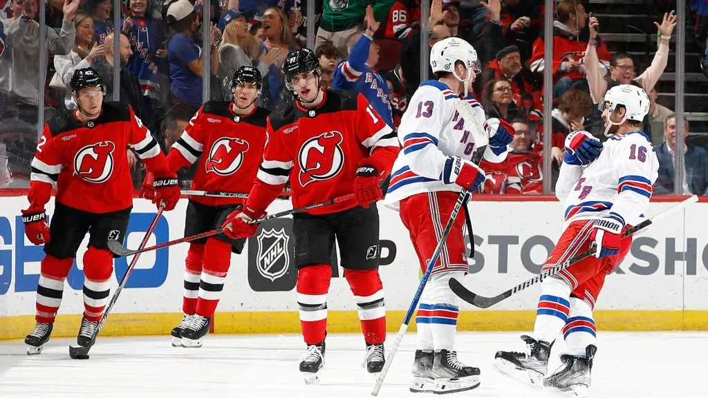 Vincent Trocheck #16 celebrates with Alexis Lafreniere #13 of the New York Rangers after Lafreniere’s goal during the second period against the New Jersey Devils on February 22, 2024. (Source: Sarah Stier/Getty Images)