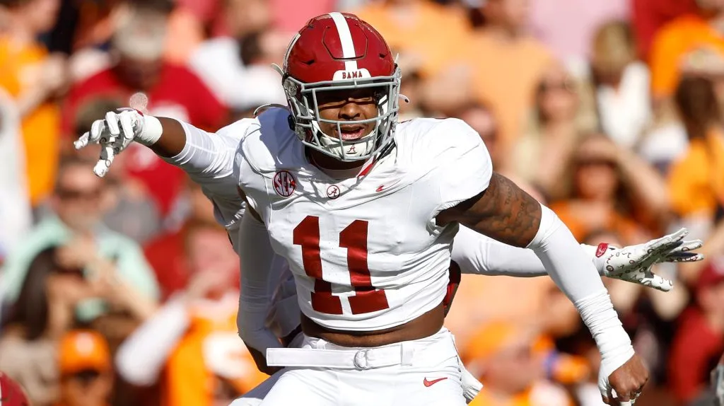 Jihaad Campbell #11 of the Alabama Crimson Tide celebrates with teammates after recovering a fumble during the first quarter against the Tennessee Volunteers at Neyland Stadium on October 19, 2024 in Knoxville, Tennessee.