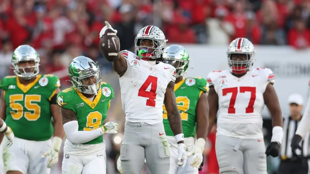 Jeremiah Smith #4 of the Ohio State Buckeyes reacts after a first down during the third quarter against the Oregon Ducks during the Rose Bowl Game Presented by Prudential at Rose Bowl Stadium on January 01, 2025 in Pasadena, California.