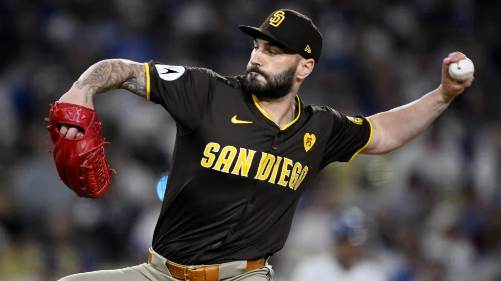 Tanner Scott #66 of the San Diego Padres pitches in the eighth inning against the Los Angeles Dodgers during Game Two of the Division Series at Dodger Stadium on October 06, 2024 in Los Angeles, California. (Photo by Orlando Ramirez/Getty Images)