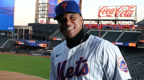 Juan Soto of the New York Mets poses with his new uniform after his introductory press conference at Citi Field on December 12, 2024 in New York City.
