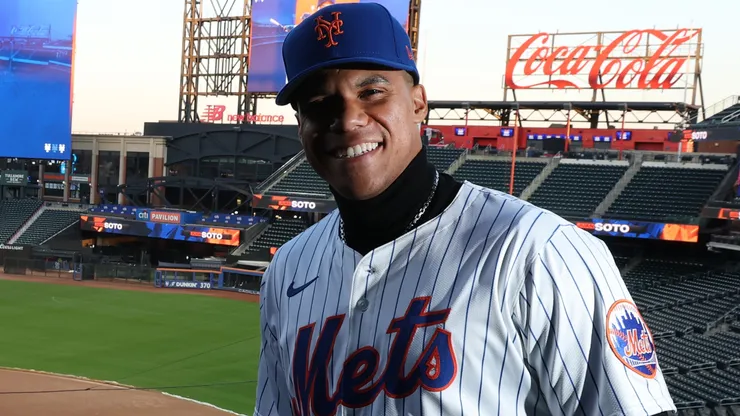 Juan Soto of the New York Mets poses with his new uniform after his introductory press conference at Citi Field on December 12, 2024 in New York City.