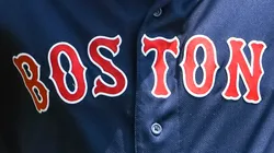 A close-up of Hunter Renfroe's #10 jersey of the Boston Red Sox as he breaks a baseball bat over his head during the top of the fourth inning against the Detroit Tigers at Comerica Park.