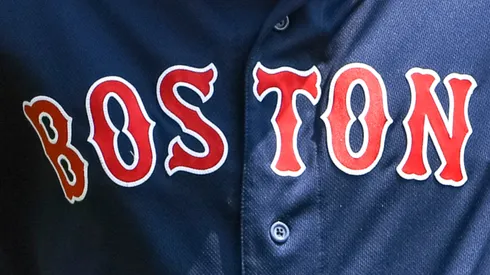 A close-up of Hunter Renfroe's #10 jersey of the Boston Red Sox as he breaks a baseball bat over his head during the top of the fourth inning against the Detroit Tigers at Comerica Park.