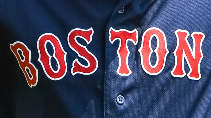 A close-up of Hunter Renfroe's #10 jersey of the Boston Red Sox as he breaks a baseball bat over his head during the top of the fourth inning against the Detroit Tigers at Comerica Park.