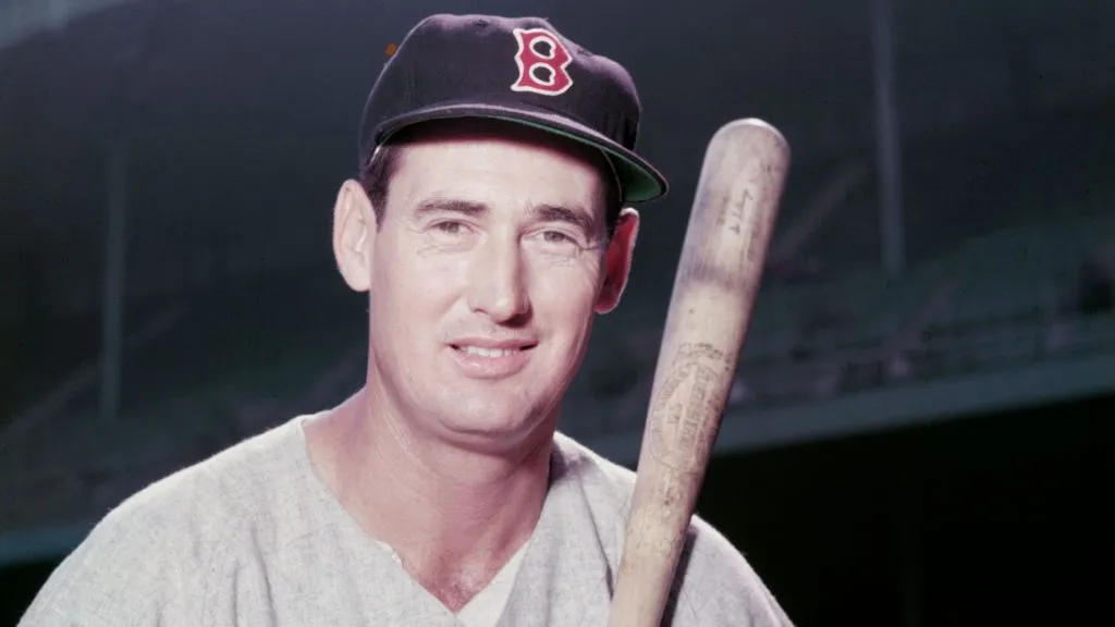 Baseball legend Ted Williams of the Boston Red Sox holds a baseball bat circa 1955. (Source: Getty Images)