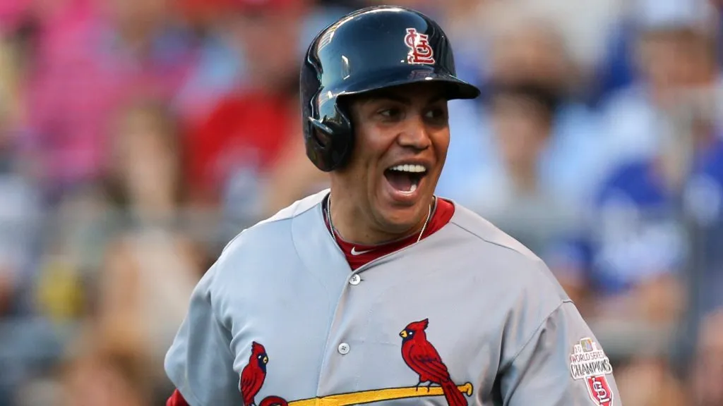 Carlos Beltran #3 of the St. Louis Cardinals celebrate after scoring on a David Freese double during an interleague game against the Kansas City Royals at Kauffman Stadium on June 22, 2012. (Source: Ed Zurga/Getty Images)
