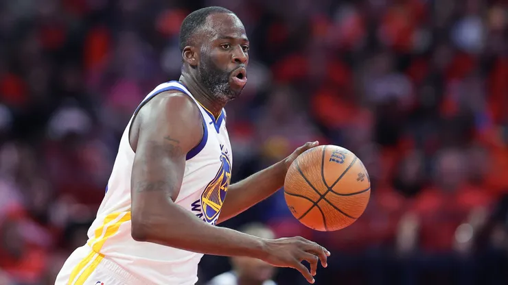 Draymond Green #23 of the Golden State Warriors drives against the Houston Rockets during the second half of a quarterfinal game in the NBA Emirates Cup.