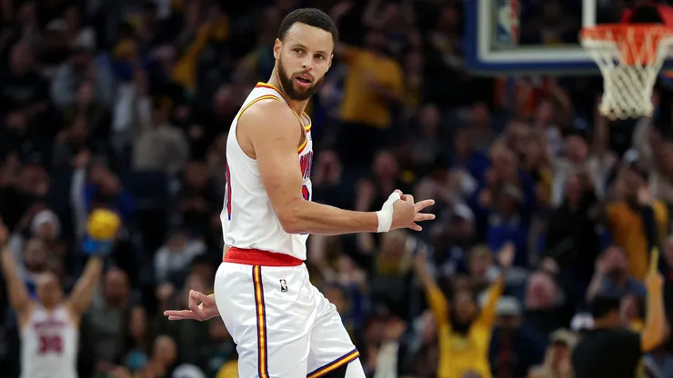 Stephen Curry #30 of the Golden State Warriors reacts after he made a three-point basket against the Philadelphia 76ers during the second half at Chase Center.