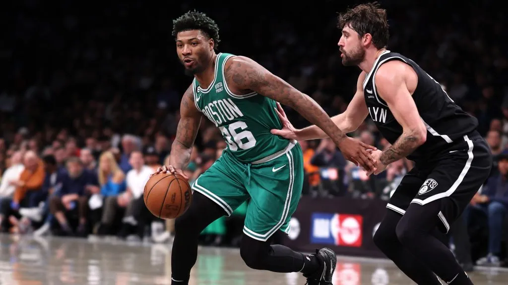 Marcus Smart #36 of the Boston Celtics drives against Joe Harris #12 of the Brooklyn Nets during their game at Barclays Center on January 12, 2023. (Source: Al Bello/Getty Images)