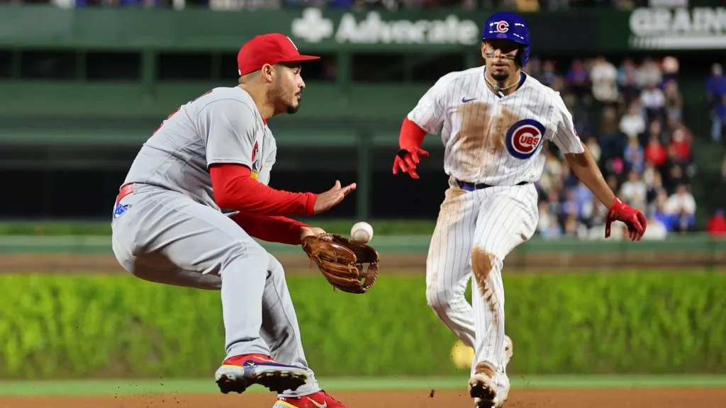Nolan Arenado #28 of the St. Louis Cardinals fields a ground ball and tags out Christopher Morel #5 of the Chicago Cubs during the eighth inning at Wrigley Field on May 09, 2023. (Source: Michael Reaves/Getty Images)