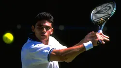 Mark Philippoussis of Australia in action during day five of the championships played at the All England Club in Wimbledon.