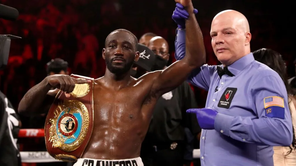 WBO champion Terence Crawford poses with referee Celestino Ruiz after defeating Shawn Porter in a welterweight title fight at Michelob ULTRA Arena. Crawford retained his title with a 10th-round TKO. (Photo by Steve Marcus/Getty Images)