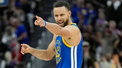Stephen Curry #30 of the Golden State Warriors reacts after scoring against the Los Angeles Lakers during the second half at Chase Center.