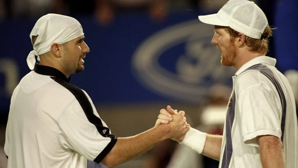 Jim Courier of the USA congratulates Andre Agassi also of the USA after the Mens Singles quarter-final during the Australian Open. (Clive Brunskill/Allsport)