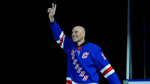 Former New York Rangers player Mark Messier waves to fans during Henrik Lundqvist's jersey retirement ceremony prior to a game between the New York Rangers and Minnesota Wild at Madison Square Garden on January 28, 2022 in New York City.