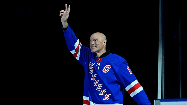 Former New York Rangers player Mark Messier waves to fans during Henrik Lundqvist's jersey retirement ceremony prior to a game between the New York Rangers and Minnesota Wild at Madison Square Garden on January 28, 2022 in New York City.