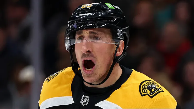 Brad Marchand #63 of the Boston Bruins disputes a call during the first period of the game against the Buffalo Sabres at TD Garden on December 21, 2024 in Boston, Massachusetts.