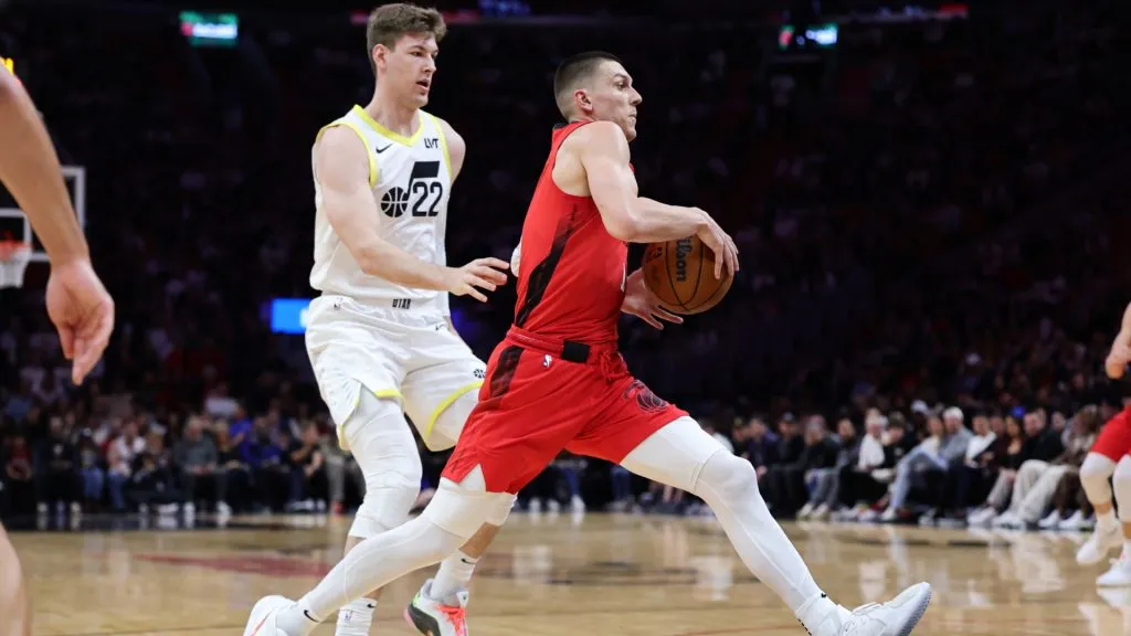 Tyler Herro #14 of the Miami Heat drives ahead of Kyle Filipowski #22 of the Utah Jazz during the first half at Kaseya Center. (Carmen Mandato/Getty Images)
