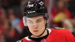 Connor Bedard #98 of the Chicago Blackhawks looks on against the Columbus Blue Jackets during the second period at the United Center on December 01, 2024 in Chicago, Illinois.