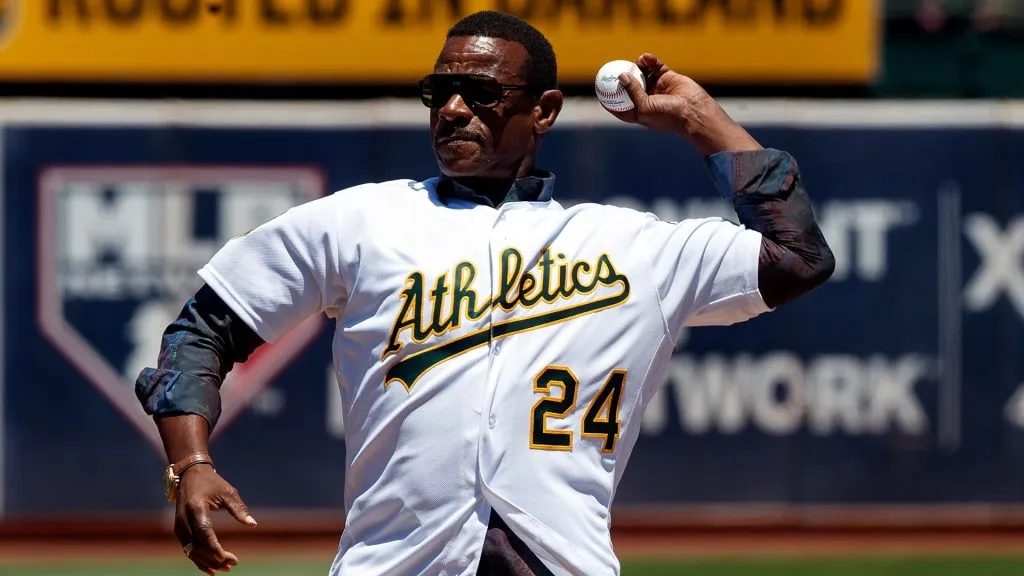 Former Oakland Athletics outfielder Rickey Henderson throws out the ceremonial first pitch before the game against the San Francisco Giants  on July 22, 2018. (Source: Jason O. Watson/Getty Images)