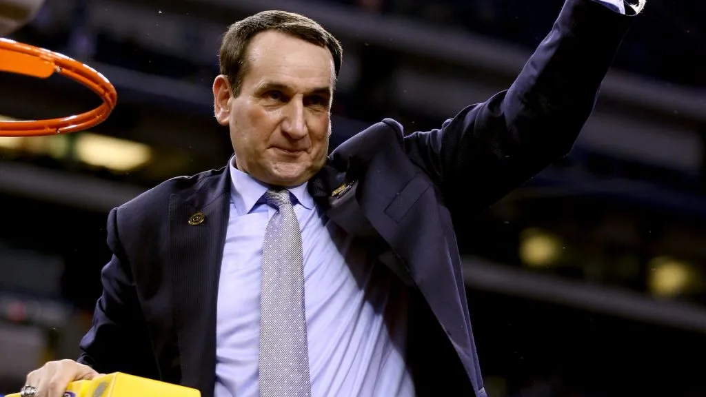 Head coach Mike Krzyzewski of the Duke Blue Devils cuts down the net after defeating the Wisconsin Badgers during the NCAA Men’s Final Four National Championship in 2015. (Source: Andy Lyons/Getty Images)
