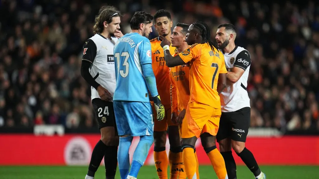 Vinicius Jr Real Madrid reacts towards Stole Dimitrievski of Valencia CF after an earlier incident (Aitor Alcalde/Getty Images)
