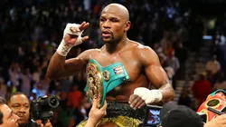 Floyd Mayweather, undefeated boxing icon, celebrated for his technical mastery and legendary defensive skills.