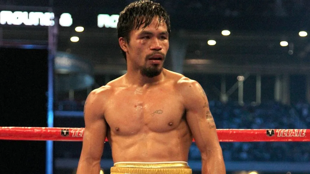 Manny Pacquiao of the Philippines looks on in the ring against Joshua Clottey of Ghana during the WBO welterweight title fight at Cowboys Stadium on March 13, 2010. (Source: Jed Jacobsohn/Getty Images)