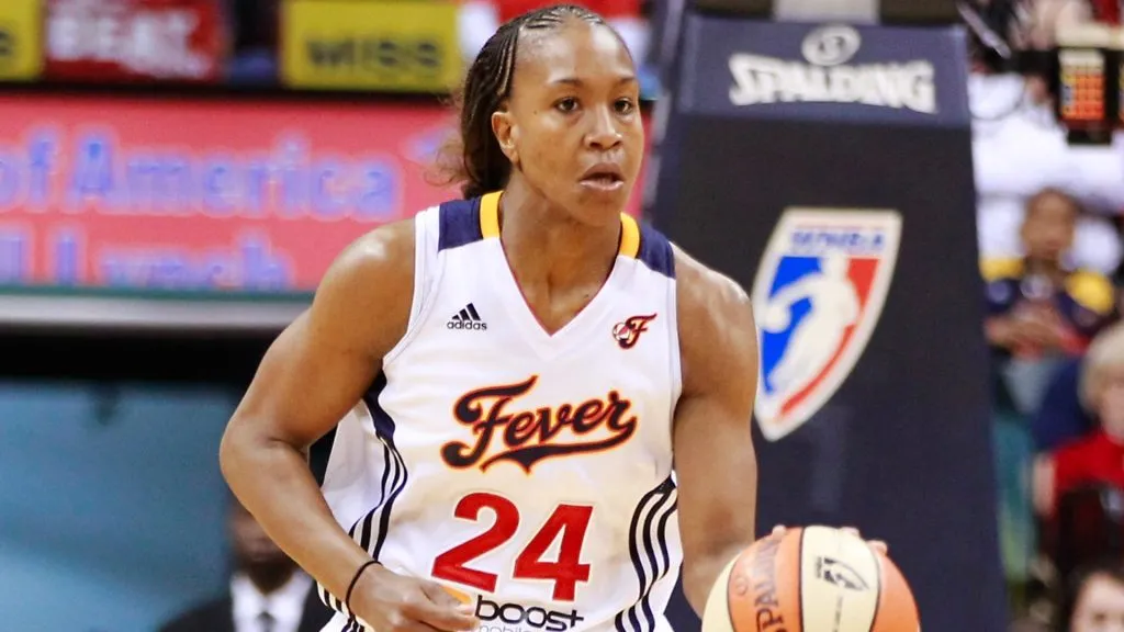 Tamika Catchings #24 of the Indiana Fever dribbles the ball up court against the Minnesota Lynx during Game Three of the 2012 WNBA Finals on October 19, 2012. (Source: Michael Hickey/Getty Images)
