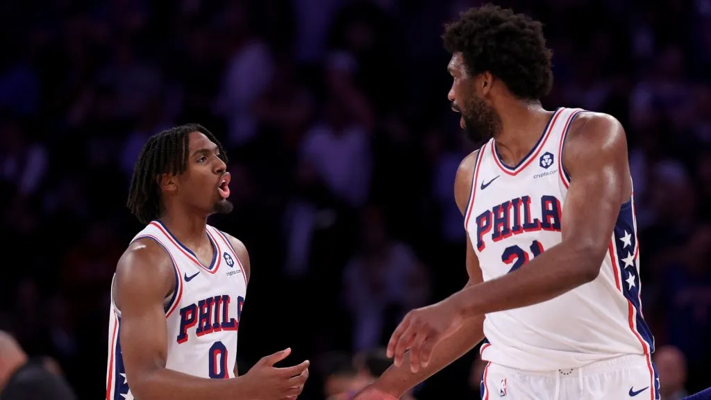 Tyrese Maxey #0 and Joel Embiid #21 of the Philadelphia 76ers talk during a game against the New York Knicks on April 30, 2024 in New York City.