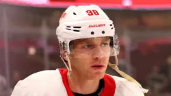 Patrick Kane #88 of the Detroit Red Wings looks on during warm ups prior to the game against the Chicago Blackhawks at the United Center on November 06, 2024 in Chicago, Illinois.