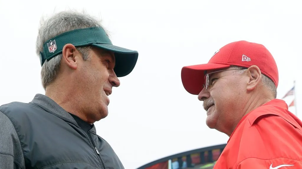 Head coach Andy Reid of the Kansas City Chiefs and head coach Doug Pederson of the Philadelphia Eagles greet each other prior to the game at Arrowhead Stadium on September 17, 2017 in Kansas City, Missouri.