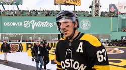 Brad Marchand #63 of the Boston Bruins prepares to take the ice prior to playing the Pittsburgh Penguins in the 2023 Discover NHL Winter Classic at Fenway Park on January 02, 2023 in Boston, Massachusetts.