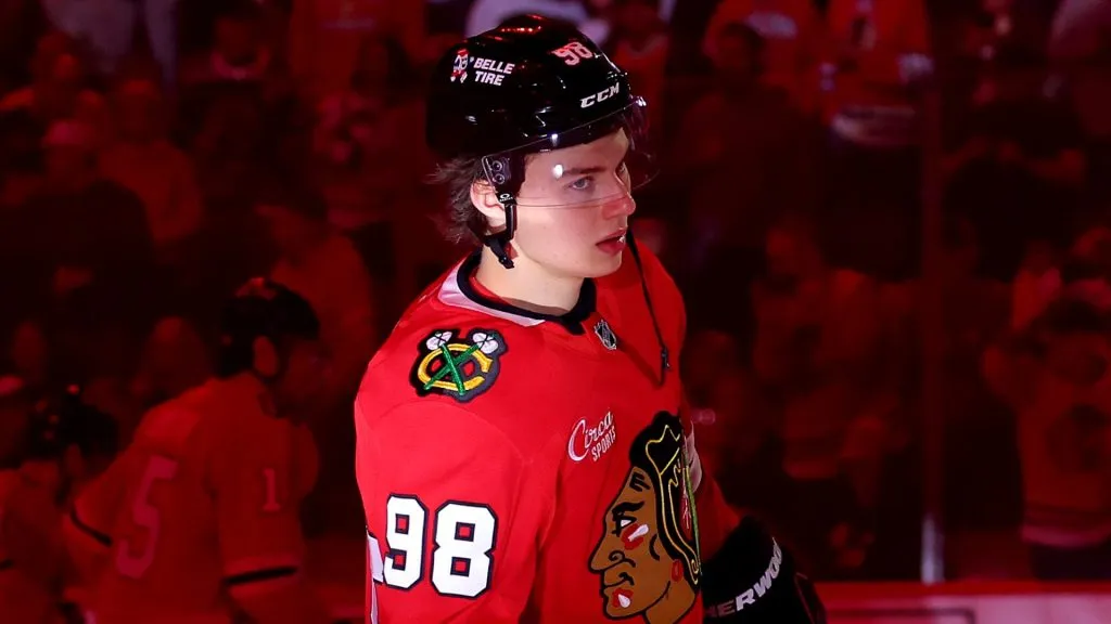 Connor Bedard #98 of the Chicago Blackhawks looks on prior to the game against the Vancouver Canucks at the United Center on October 22, 2024 in Chicago, Illinois.