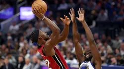 Jimmy Butler #22 of the Miami Heat shoots over Draymond Green #23 of the Golden State Warriors at Chase Center on October 27, 2022.